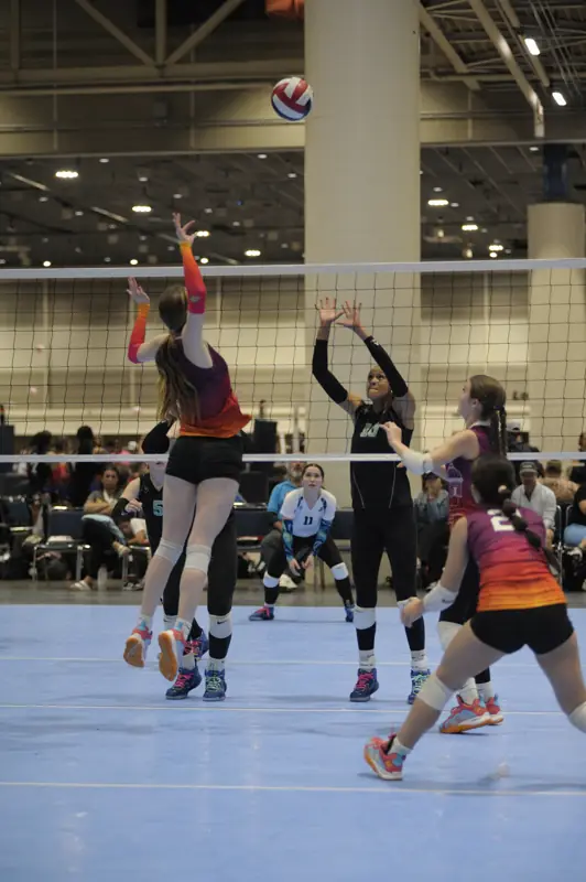 Players move to the ball during a rally